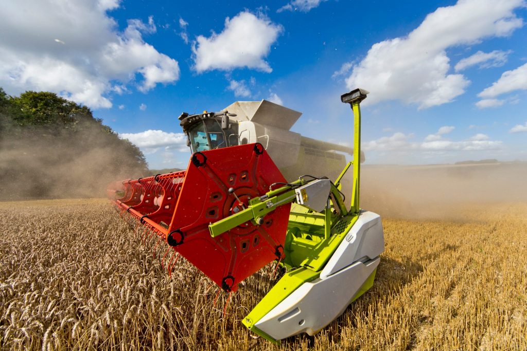 combine harvester harvesting field of wheat 2026 03 26 08 53 30 utc 1 2048x1365