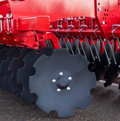 trailed in line disc harrow at an agricultural exhibition.